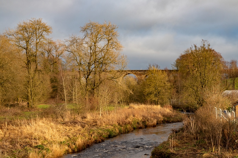 Annick Water looking east with the Stewarton Viaduct in the background.  Photo by Cara Smillie.